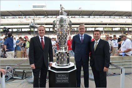 INDIANAPOLIS IN - MAY 27, 2012: ESPN on air talent Marty Reid, Eddie Cheever and Scott Goodyear pose with the Borg-Warner Trophy prior to the IZOD IndyCar Series 96th running of the Indianapolis 500 at the Indianapolis Motor Speedway<br /> (Photo by Phil Ellsworth / ESPN)<br /> - RAW FILE AVAILABLE -